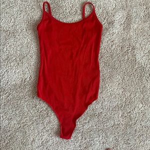 Red body suit